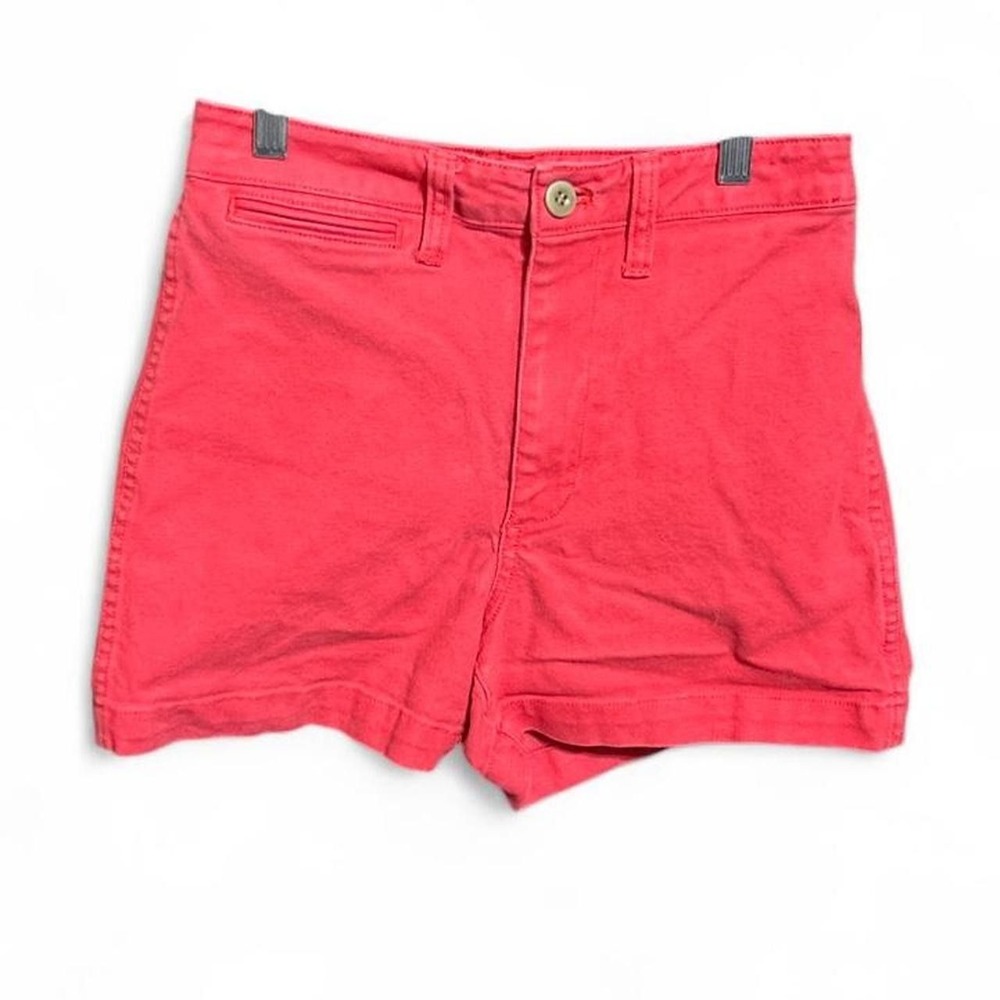 Madewell high-rise utility denim shorts in a vibrant coral-red wash - size 25